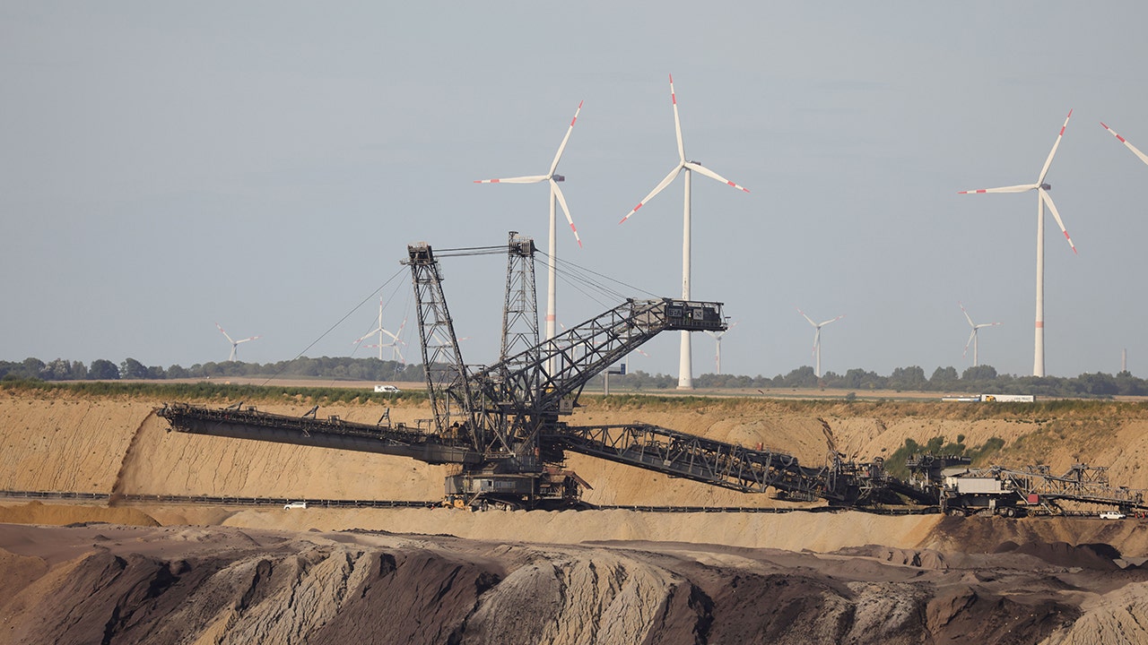 Coal mine demolishes neighboring wind farm to boost country's energy supply, drawing ire of climate activists