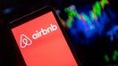 FILE:  In this photo illustration a Airbnb logo seen displayed on a smartphone. 