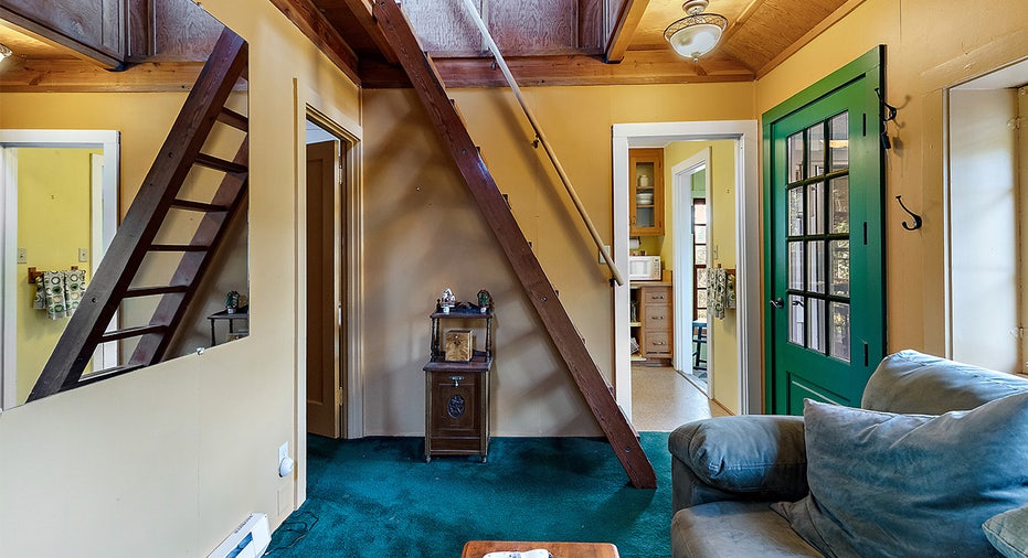 Room with loft-like ladder