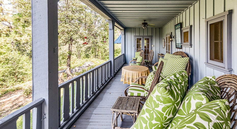 Porch with green furniture