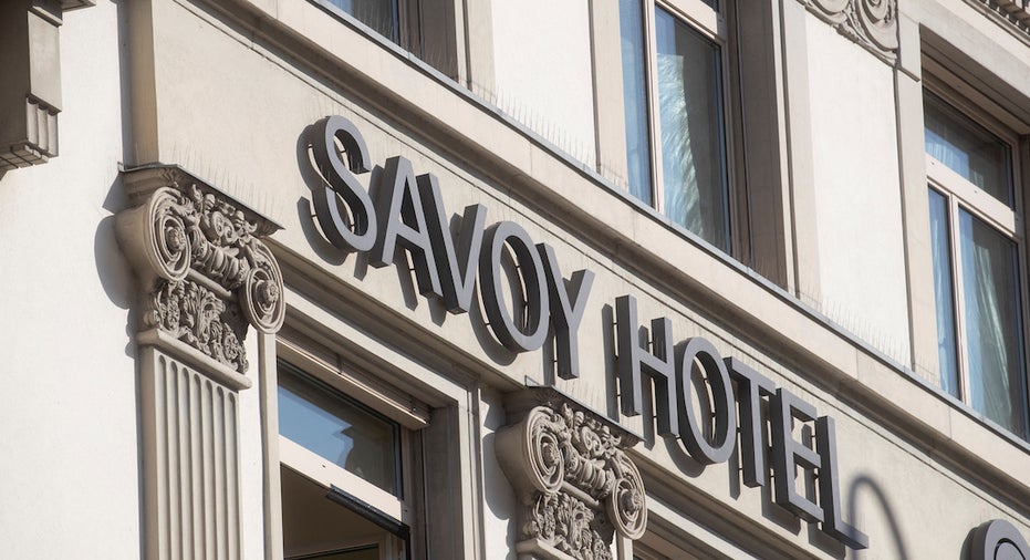 Credit Suisse to buy back $3B in debt, sell Hotel Savoy