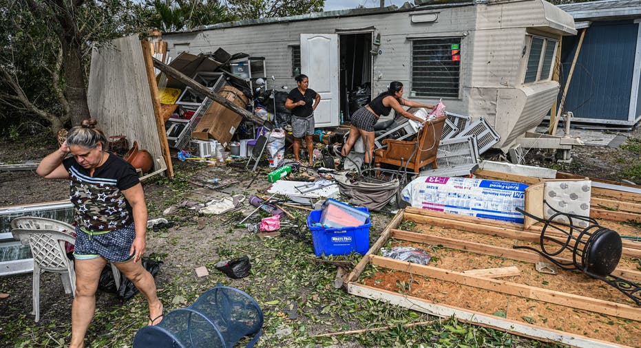 Florida residents cleaning up Hurricane Ian debris