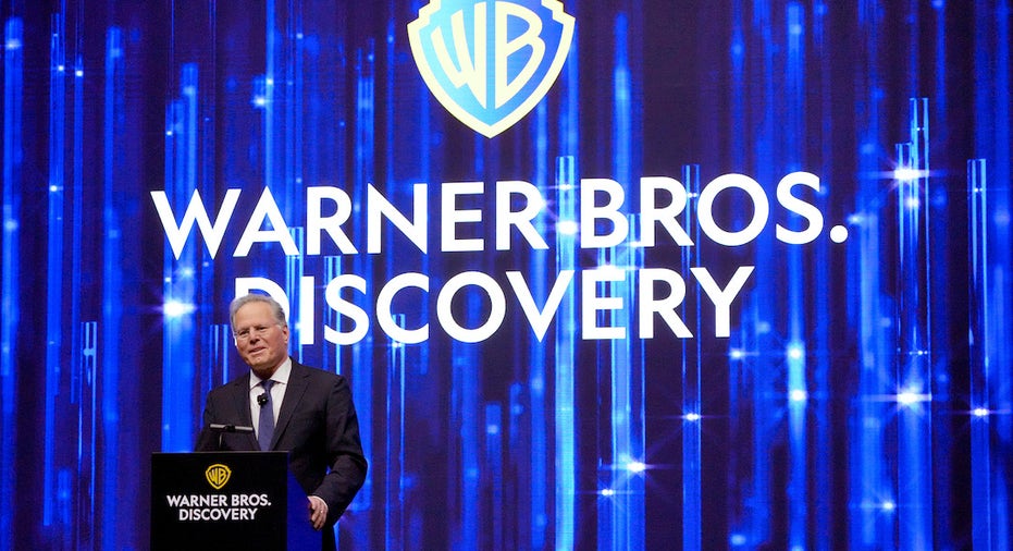 David Zaslav and Warner Bros Discovery logo