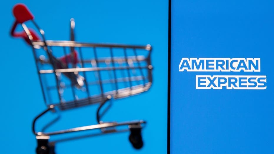 American Express logo next to toy shopping cart