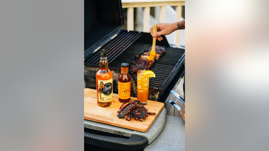 Sailor Jerry bbq sauce on grill