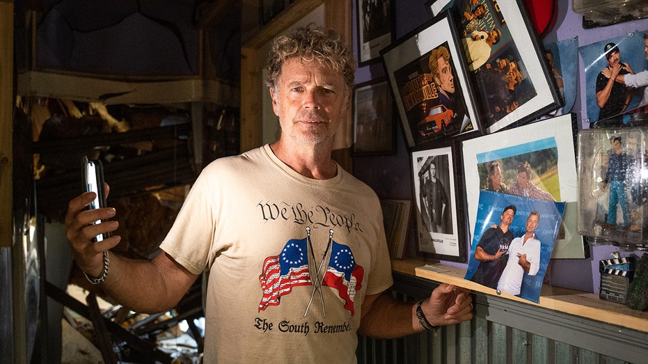 John Schneider inside his home