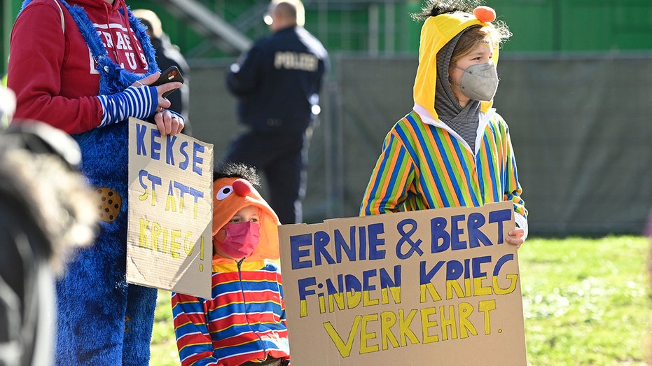 Children in Sesame Street costumes protest