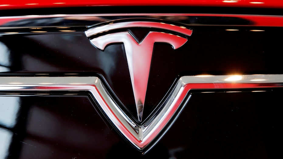 Federal EV tax credit slashed in half for some Tesla models in