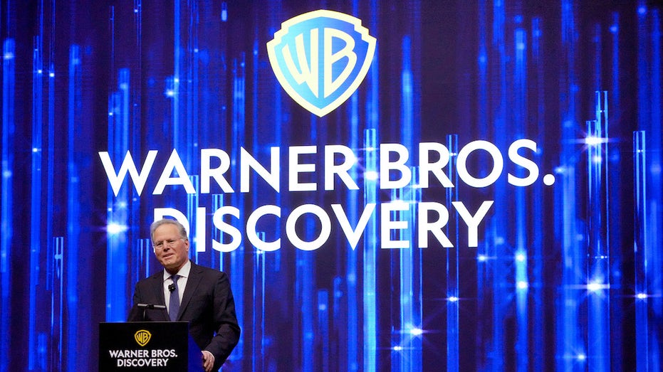 David Zaslav and Warner Bros Discovery logo