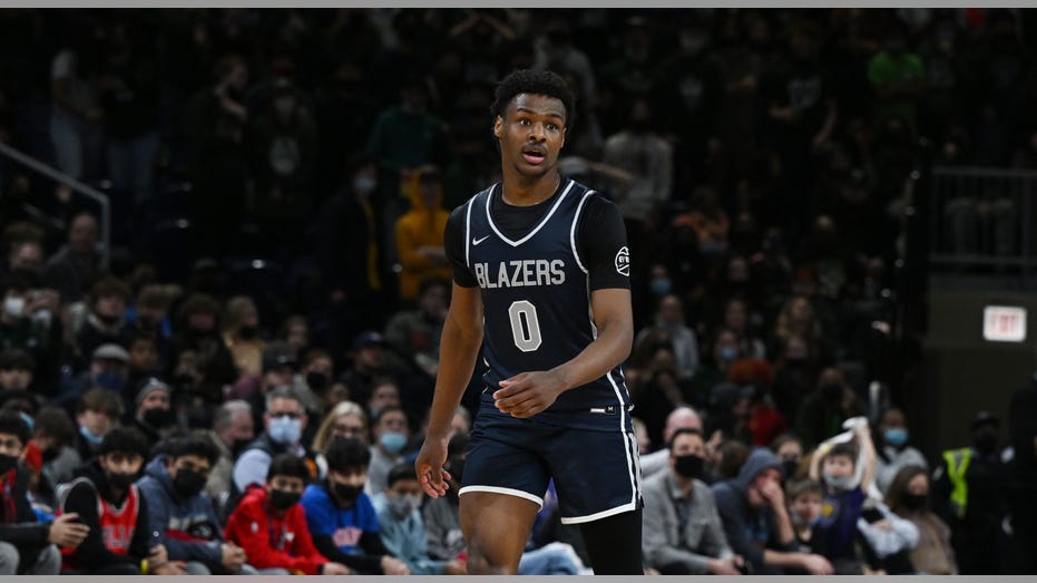 Bronny James walks on court