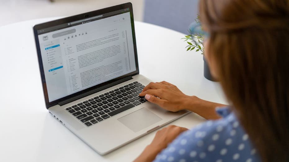 Woman reads email