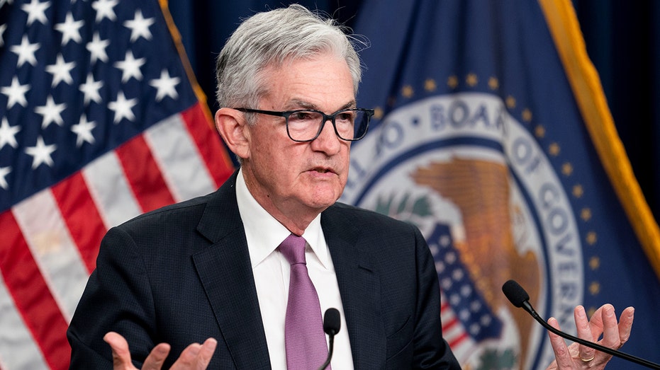 Fed Chairman Jerome Powell speaking while gesturing with his hands