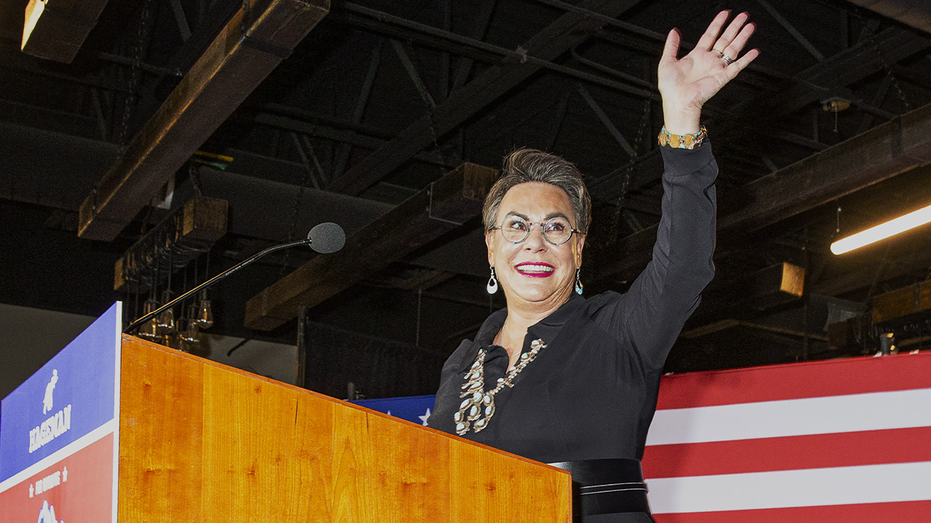 Republican candidate Harriet Hageman waves to supporters.