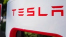 A close up of a Tesla logo on a charger at a Supercharger rapid battery charging station for the electric vehicle company Tesla Motors, in the Silicon Valley town of Mountain View, California, August 24, 2016.