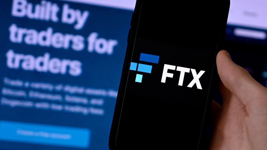 FTX logo on a phone