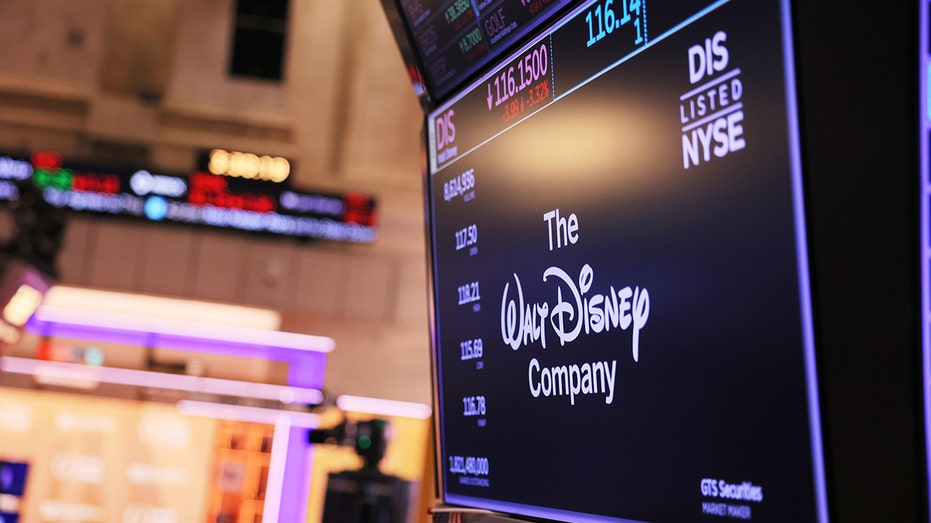 Walt Disney logo on a stock window