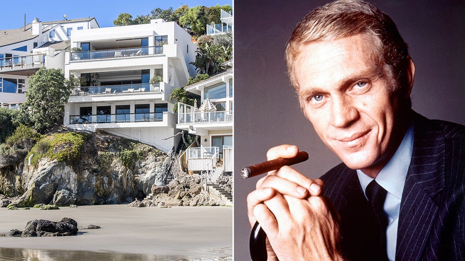 Steve McQueen smiling next to a photo of his luxurious Malibu beach house