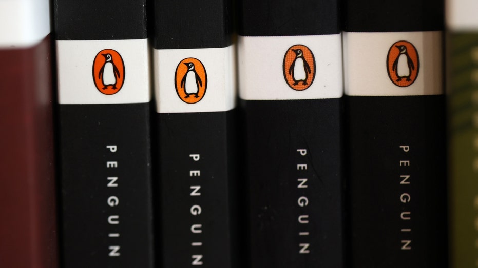 The Penguin logo on a row of books