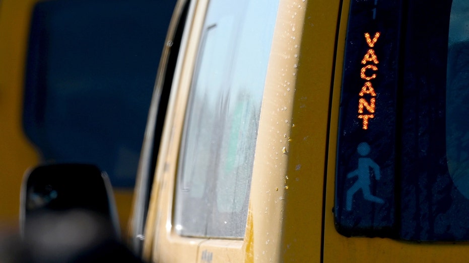 A vacant sign is on a yellow cab taxi