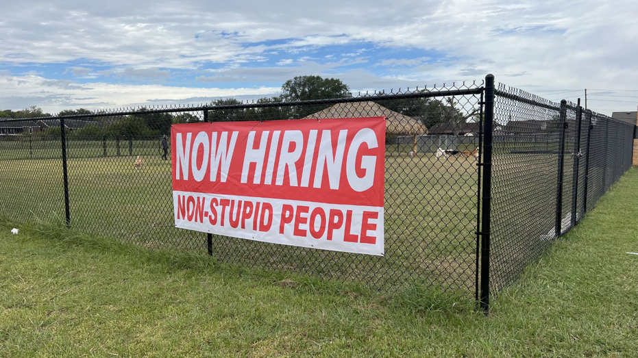 'Now hiring non-stupid people' sign