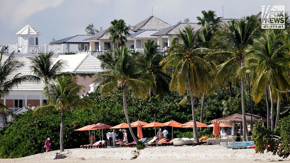 Orange umbrellas at beach