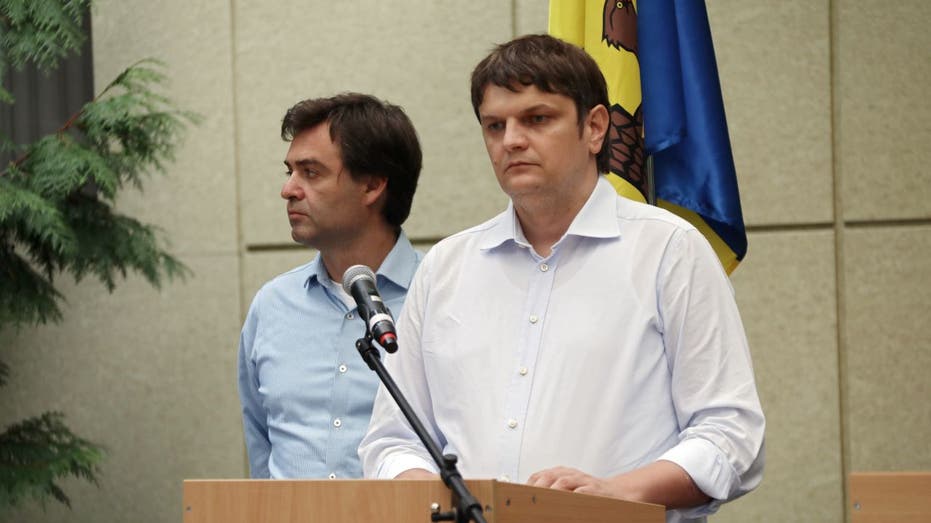 Andrei Spinu speaks at press conference