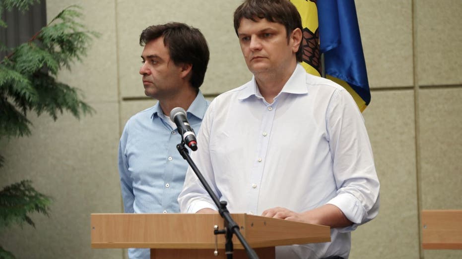 Andrei Spinu speaks at press conference