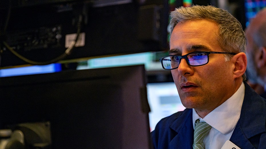 Trader on the floor of the New York Stock Exchange