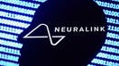 Neuralink logo displayed on a phone screen, a silhouette of a paper in shape of a human face and a binary code displayed on a screen are seen in this multiple exposure illustration photo taken in Krakow, Poland on Dec. 10, 2021.