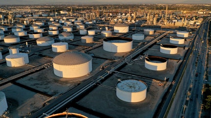 FILE PHOTO: Storage tanks are seen at Marathon Petroleum's Los Angeles Refinery, which processes domestic &amp; imported crude oil into California Air Resources Board (CARB), gasoline, diesel fuel, and other petroleum products, in Carson, California, U.S., March 11, 2022. Picture taken with a drone. REUTERS/Bing Guan