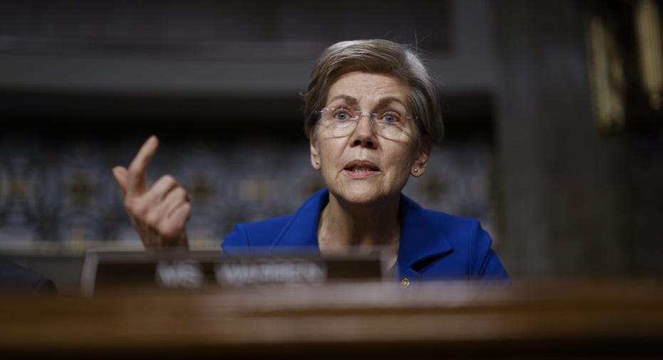 Massachusetts Senator Elizabeth Warren asks questions during a Senate Banking Committee hearing on FTX's collapse