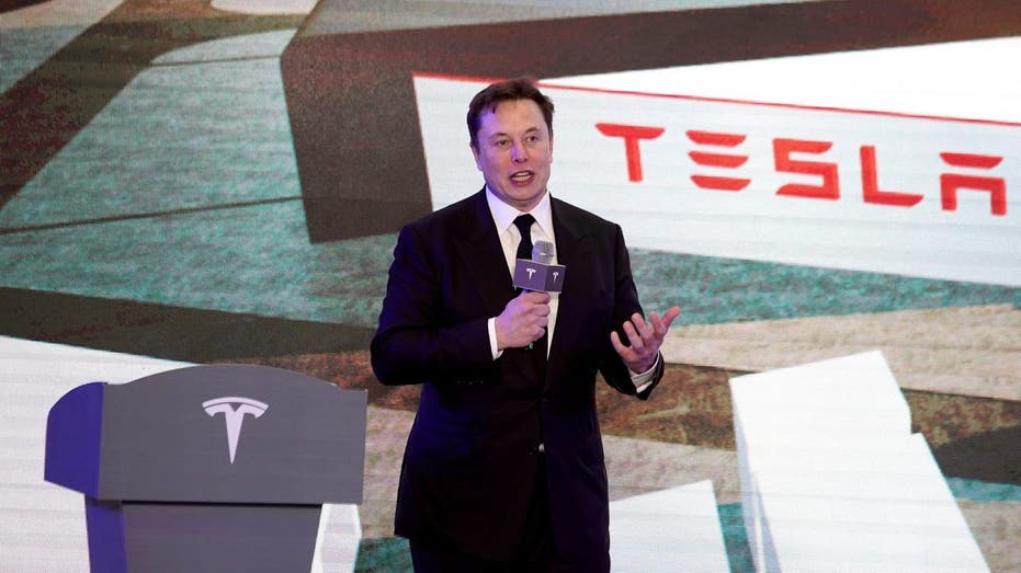 Elon Musk gives a speech in Shanghai
