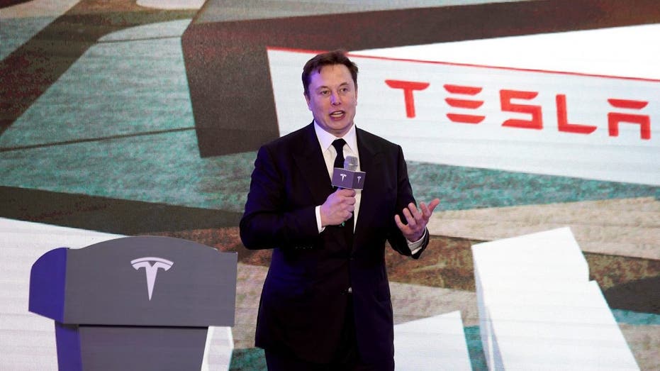 Elon Musk gives a speech in Shanghai