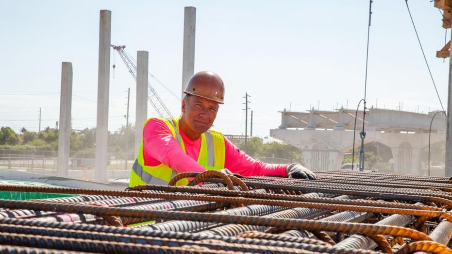 Mike Rowe doing construction