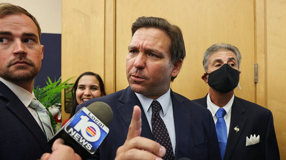 Ron DeSantis swarmed by reporters over social media law