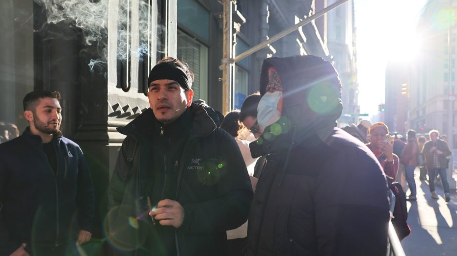 Customers wait in line at weed store in NYC