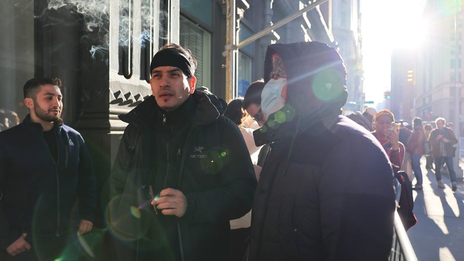 Customers waiting in line at a weed store in New York