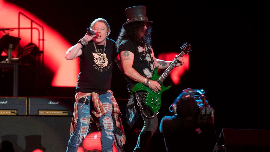 Axl Rose and Slash perform