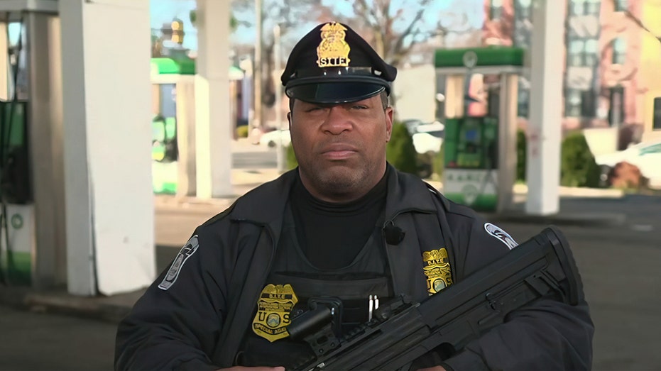 Chief Andre Boyer outside gas station