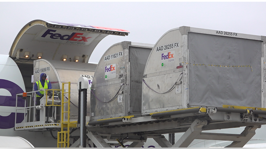 Carriers being unloaded from the aircraft