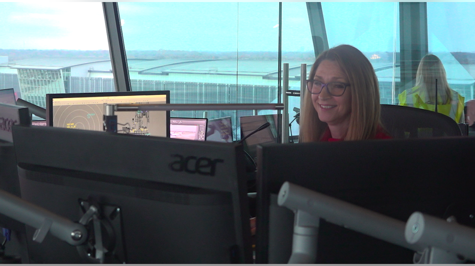 A FedEx working at the tower at the Memphis global hub