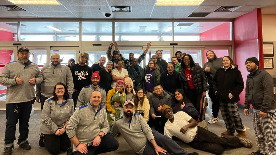 Customers posing in front of the doors at Target.