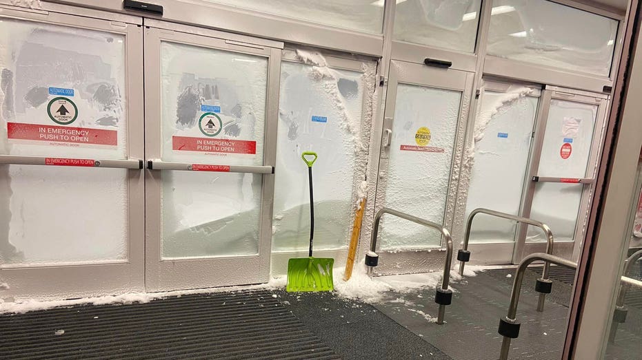Photo of the front door of a Target Frozen Shut.