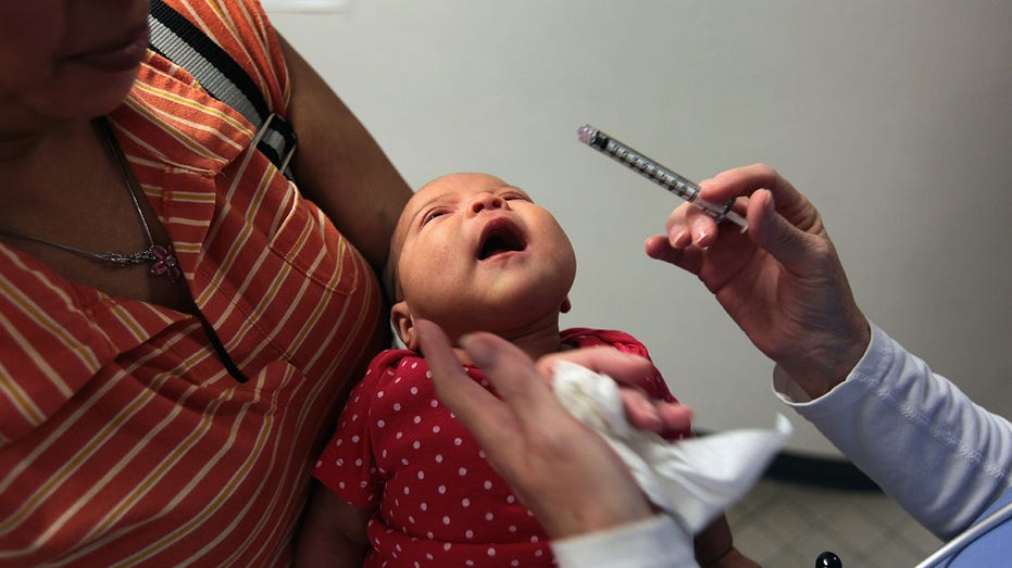 Doctor treating child