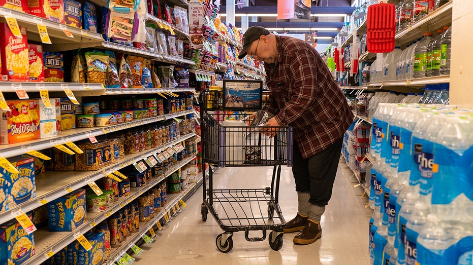 man grocery shopping