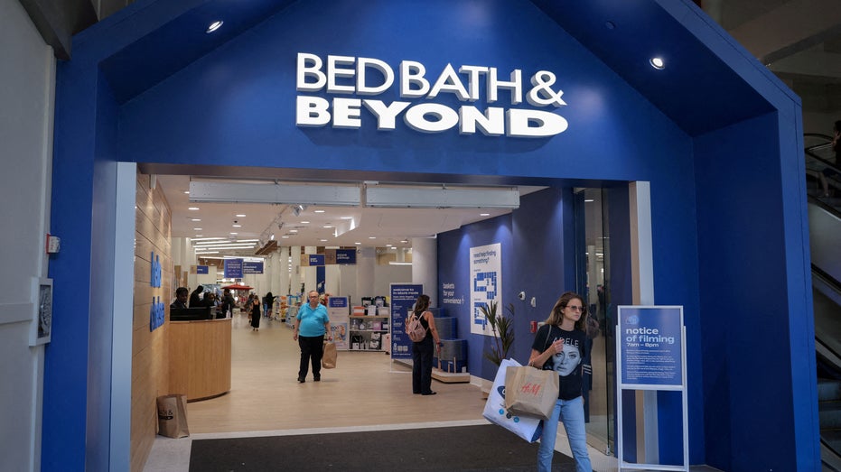 Person exits a Bed Bath & Beyond store in Manhattan, New York City