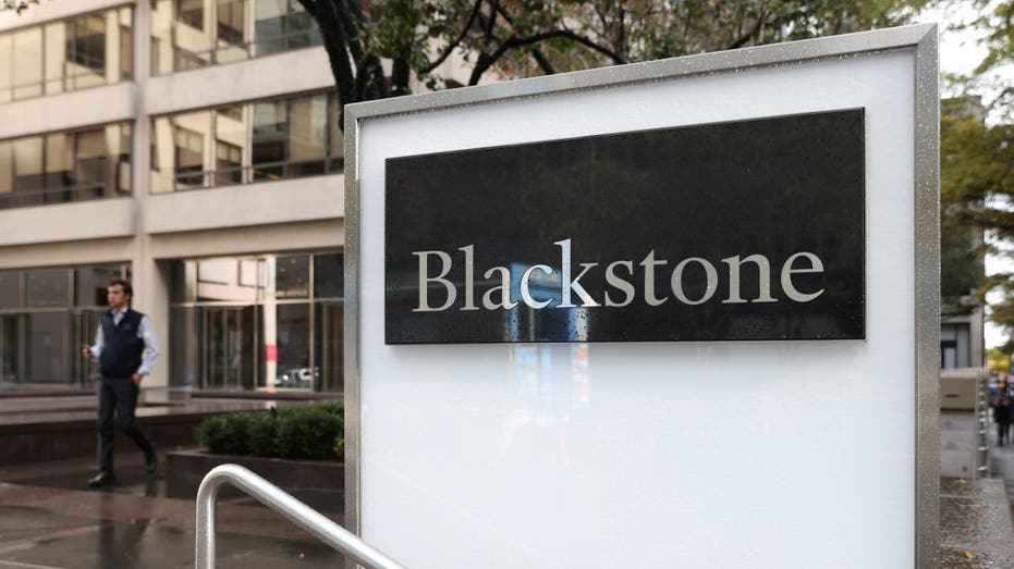 Blackstone signs