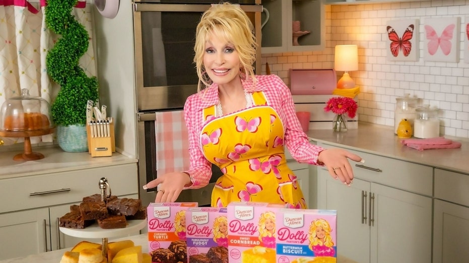 Dolly Parton with her newest Duncan Hines’ baking mixes