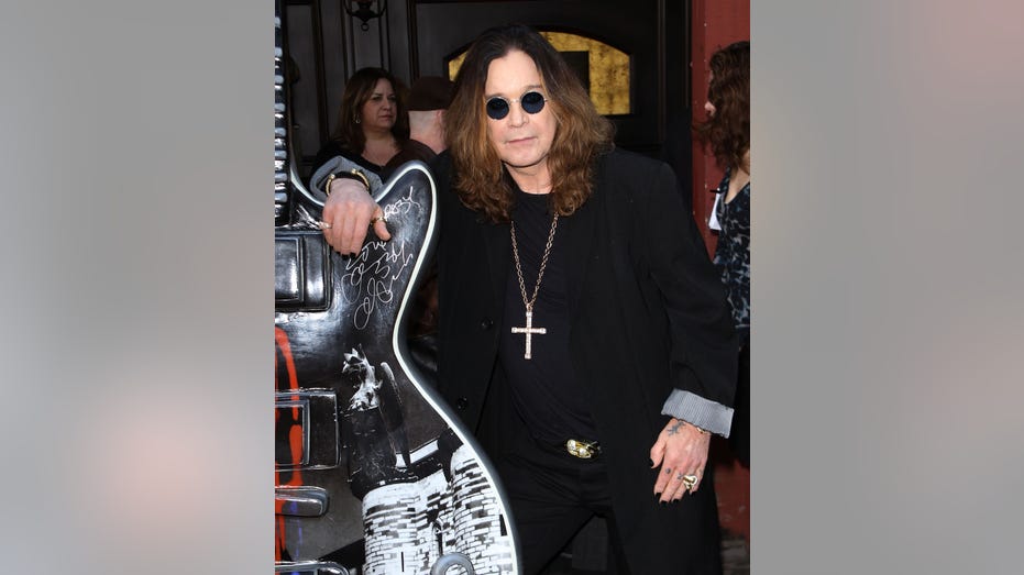 Ozzy Osbourne with guitar