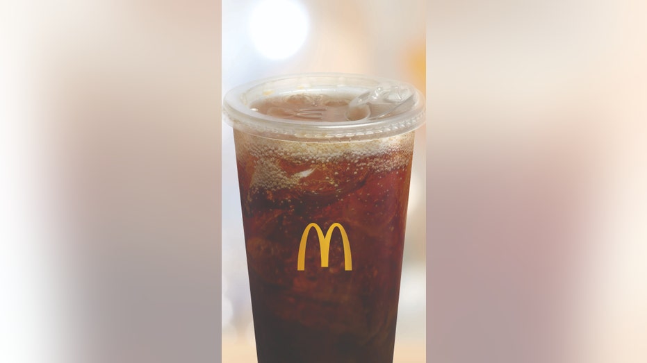 A McDonald's beverage with a strawless lid